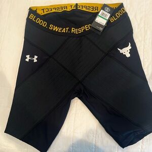 Men’s Under Armour size large, Project Rock, black compression shorts.